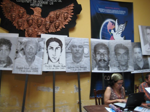 The pictures on the placards are photos of people murdered by the coup regime.